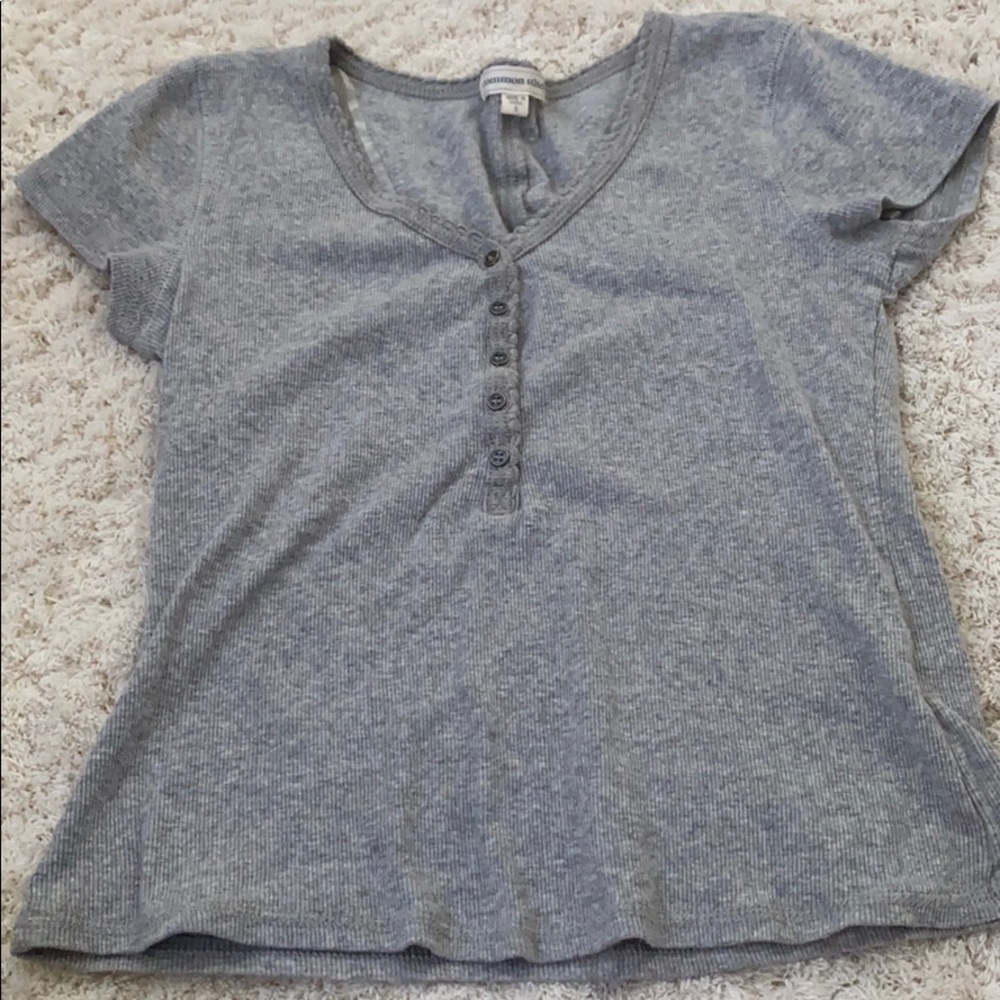 gray half button down shirt